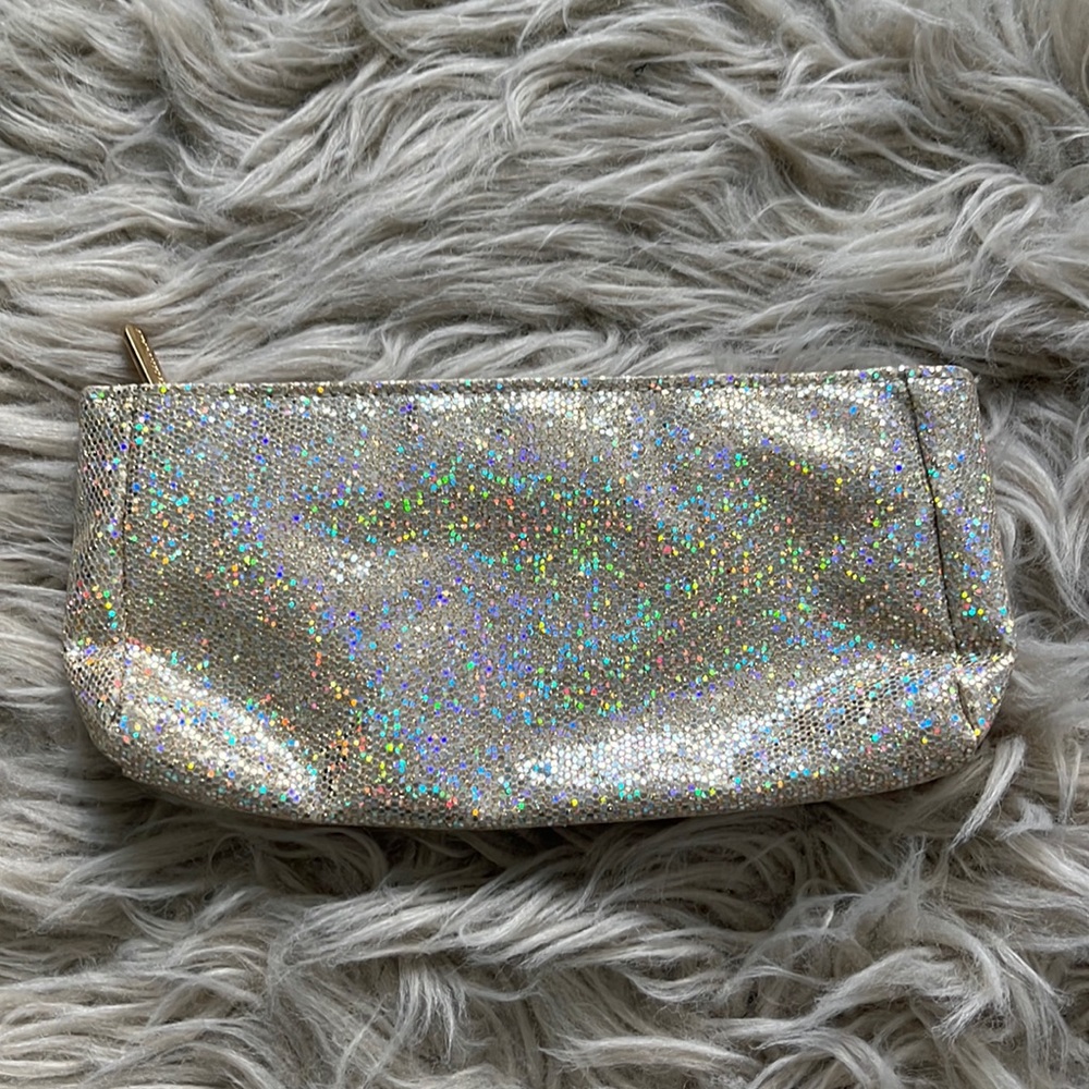 gold and rainbow holographic makeup bag